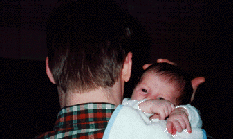 Reed Looks Over His Dad's Shoulder